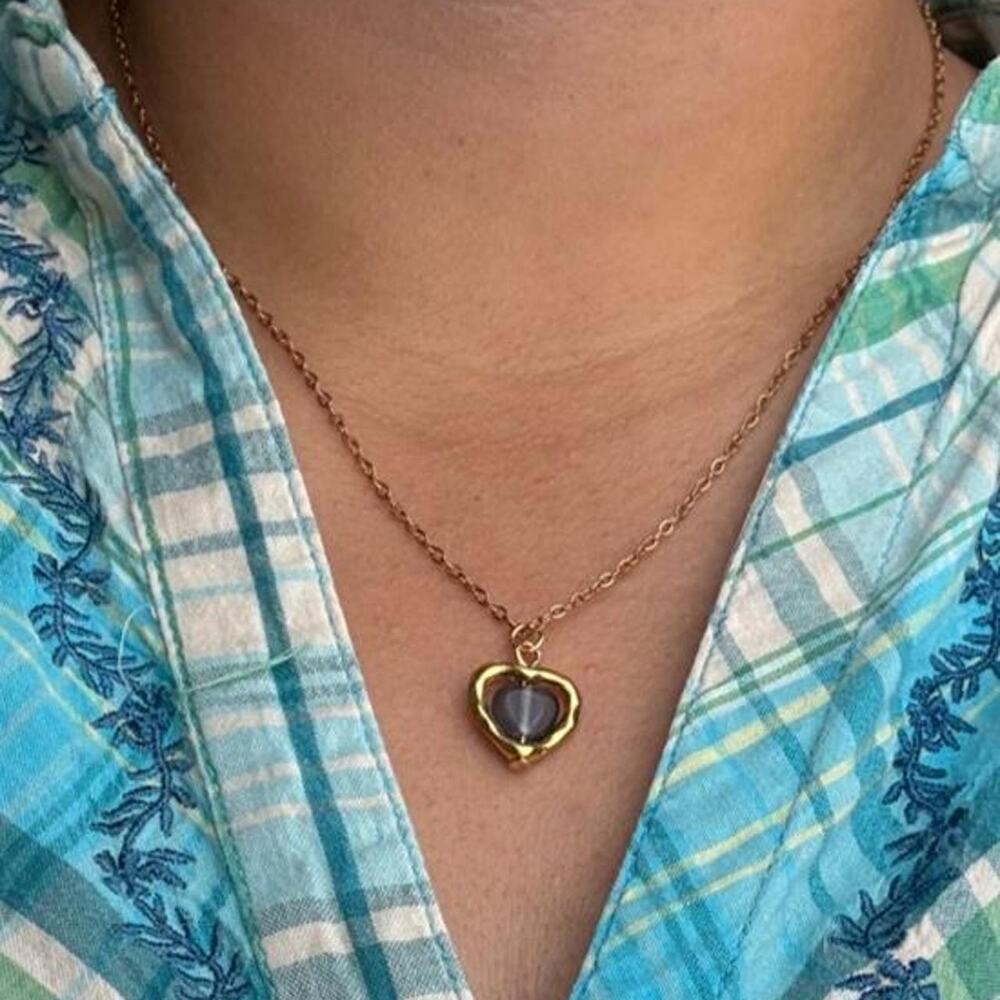 Gold hear necklace with black